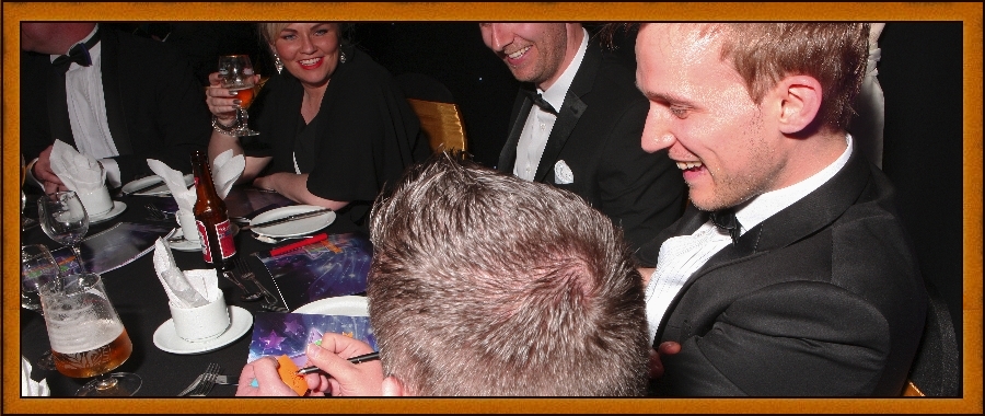 Nottingham Magician Atlas Brookings mingles with guests at a party
